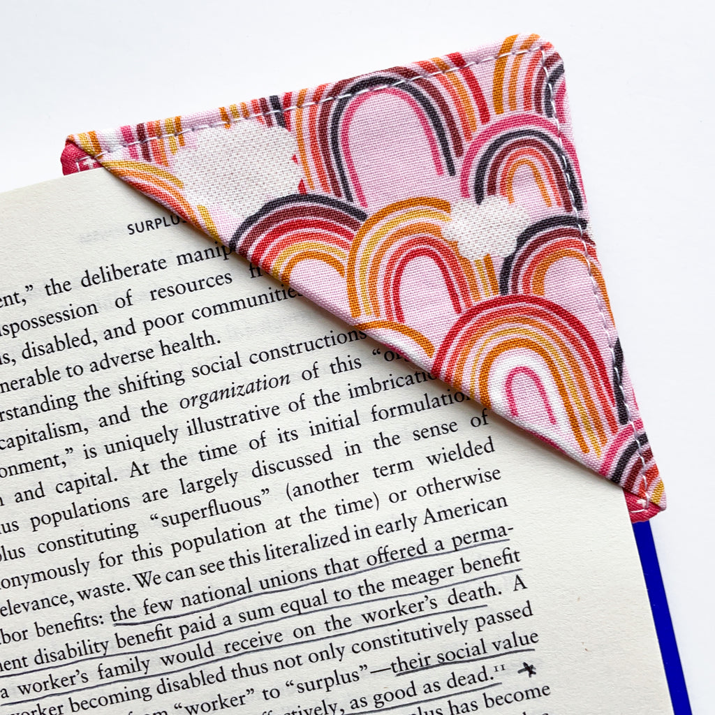fabric corner bookmark - rainbows on pink